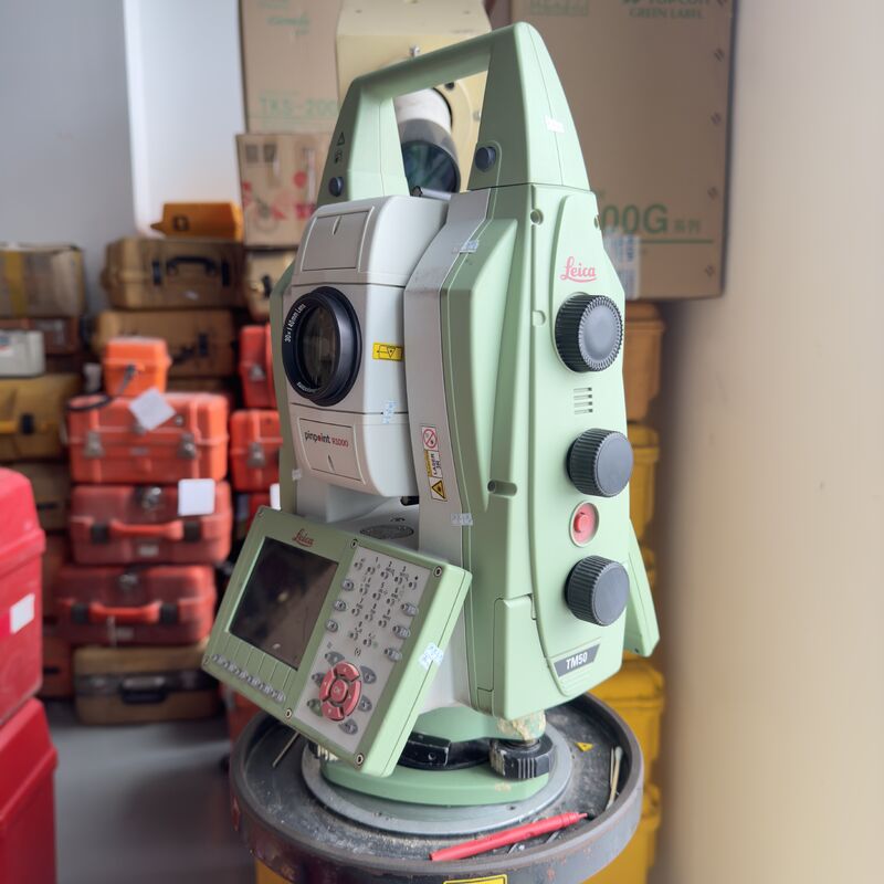 Used Leica TM50 Total Station with 1000m Non Prism Distance, Automatic Compensator ±3 Arc Minutes, and 5.0″ Capacitive Multi-Touch Screen
